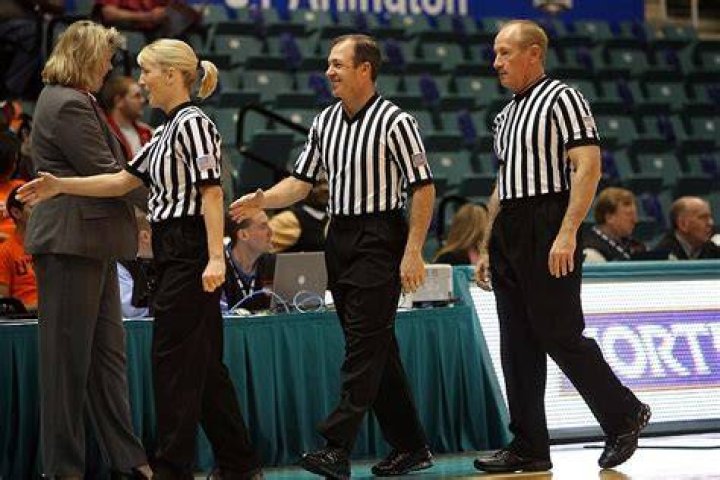 Are there referees in a basketball game?