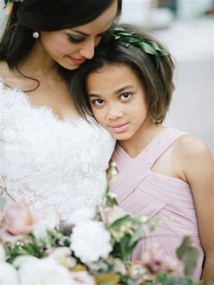 Can a junior bridesmaid throw flowers?