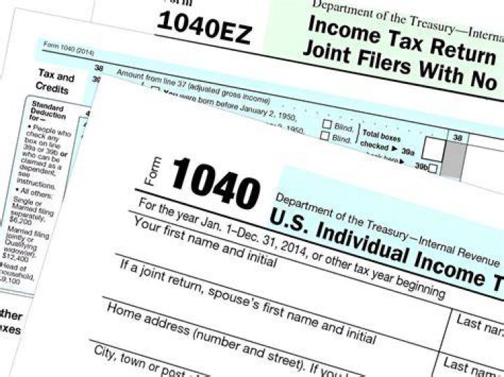Can I fill out my tax forms by hand?