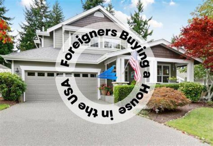 Can I stay in USA if I buy a house?