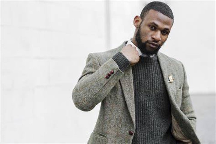 Can I wear a sweater with a suit?