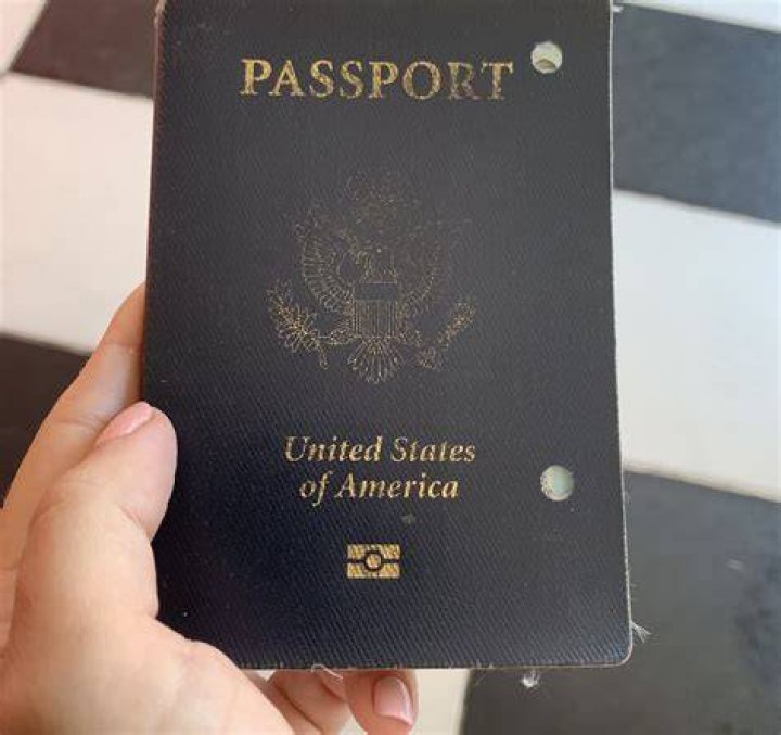 Can you use a passport with holes punched in it?