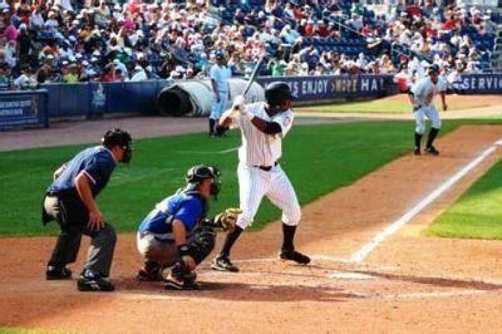 Does a runner have to retouch a base after a foul ball?