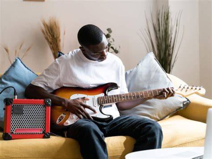 Does playing guitar make your voice better?