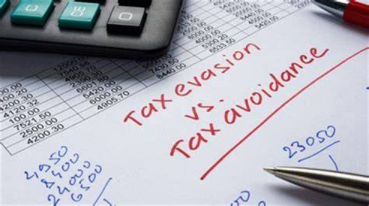 How can corporations avoid taxes?