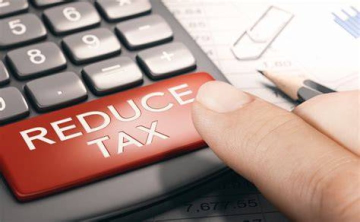 How can you reduce taxes on ISO shares?
