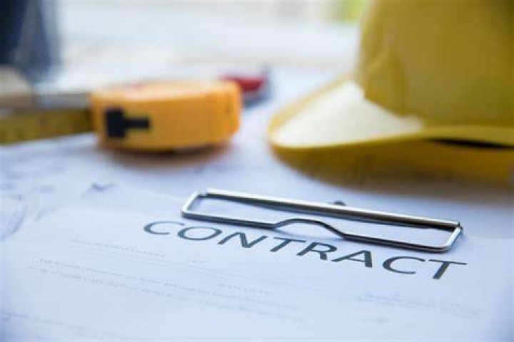 How do contractors get contracts?