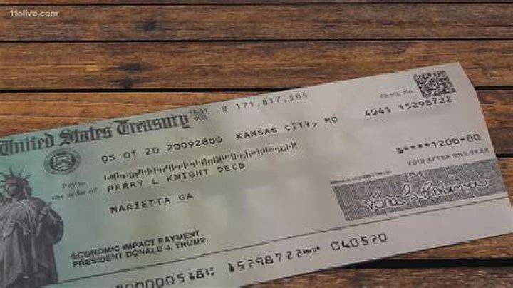 How do I return my stimulus money to my deceased spouse?