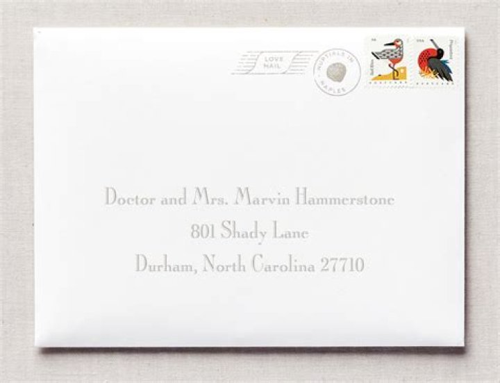 How do you address an envelope to a female doctor and husband?