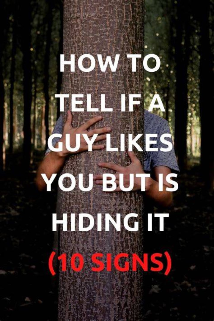How do you tell if a guy likes you but is hiding it in school?