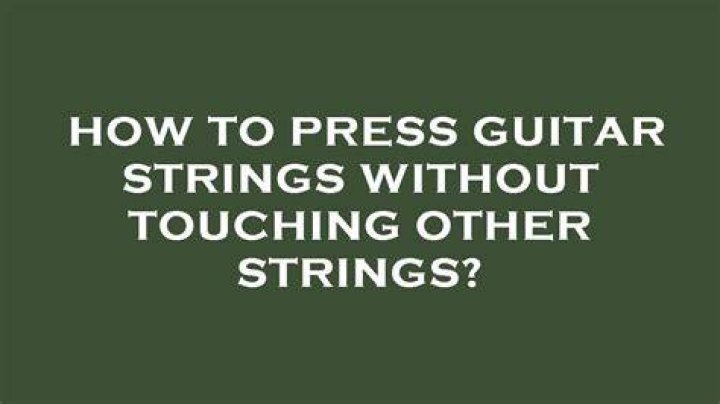 How hard should I press on guitar strings?
