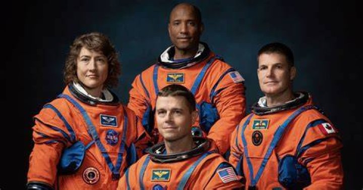 How many astronauts have a PhD?