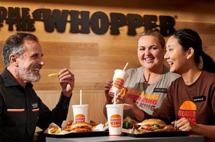 How many customers are served daily at Burger King?