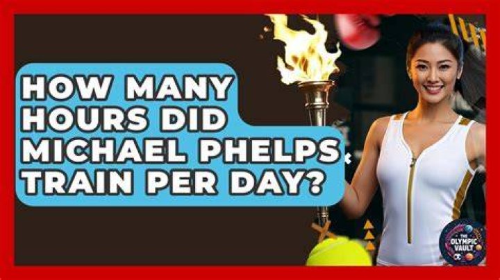 How many hours a day does Michael Phelps train?