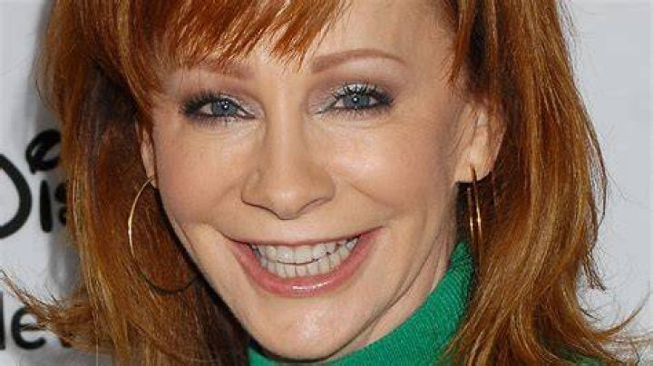 How much did Reba pay in divorce?