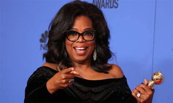 How old was Oprah when she became a billionaire?