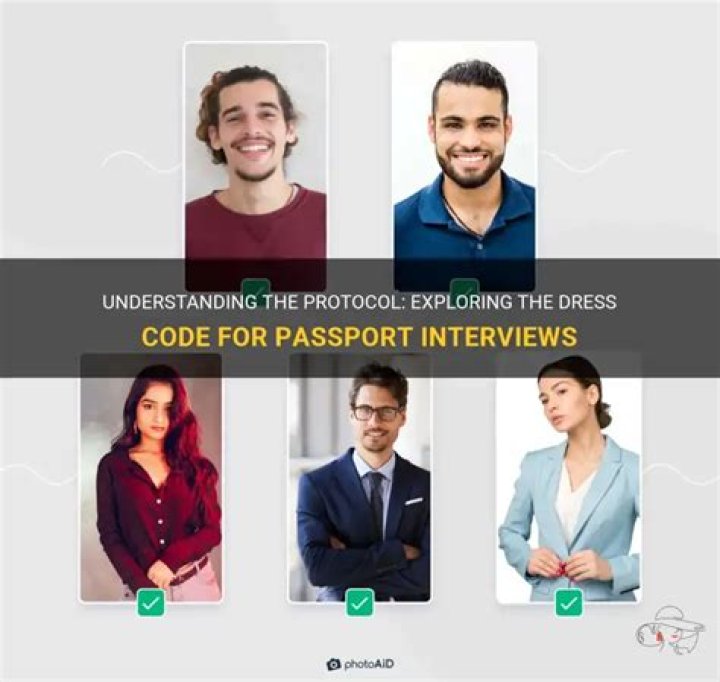 How should you dress for a passport interview?