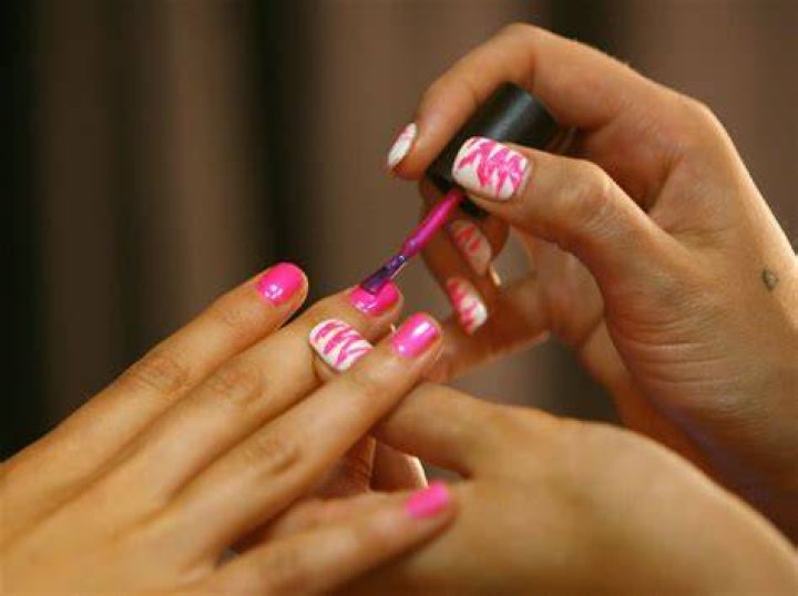 Is painting your nails girly?