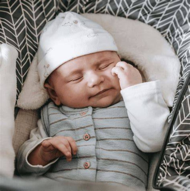 Should a newborn wear a hat outside?