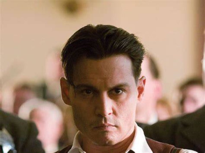 What age was Johnny Depp in Public Enemies?