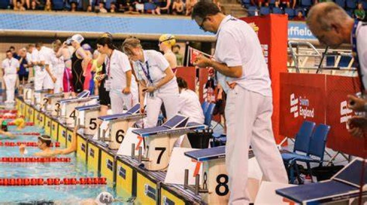 What are the duties of swimming officials?