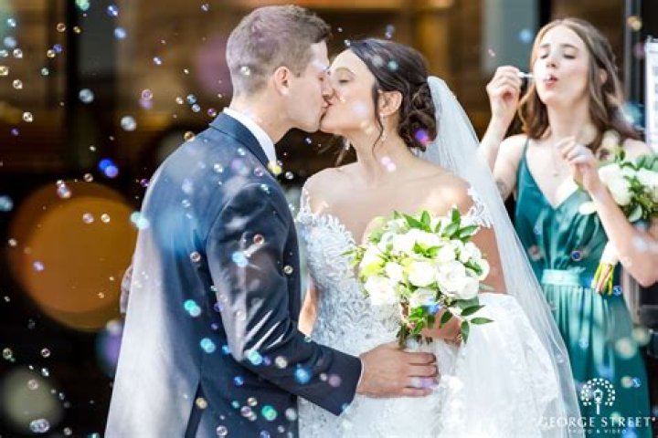 What can you do instead of kissing at a wedding?