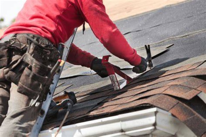 What do you call a person who repairs roof?