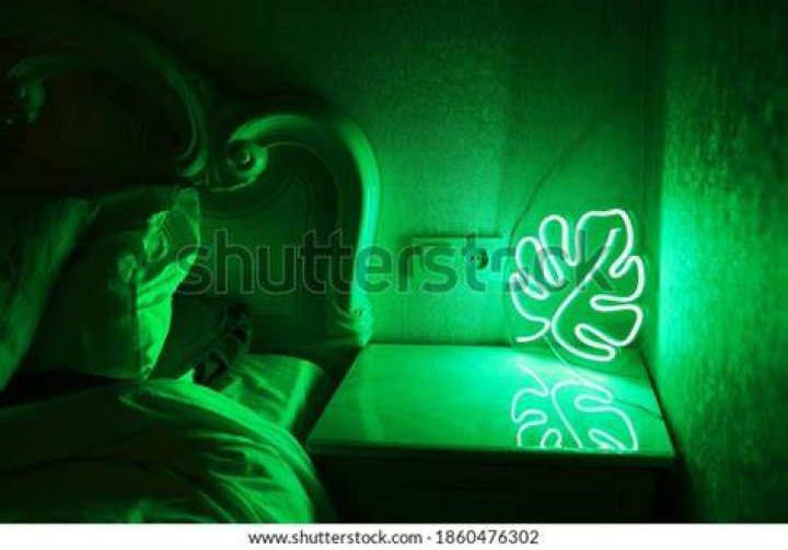 What does a green light in a bedroom mean?
