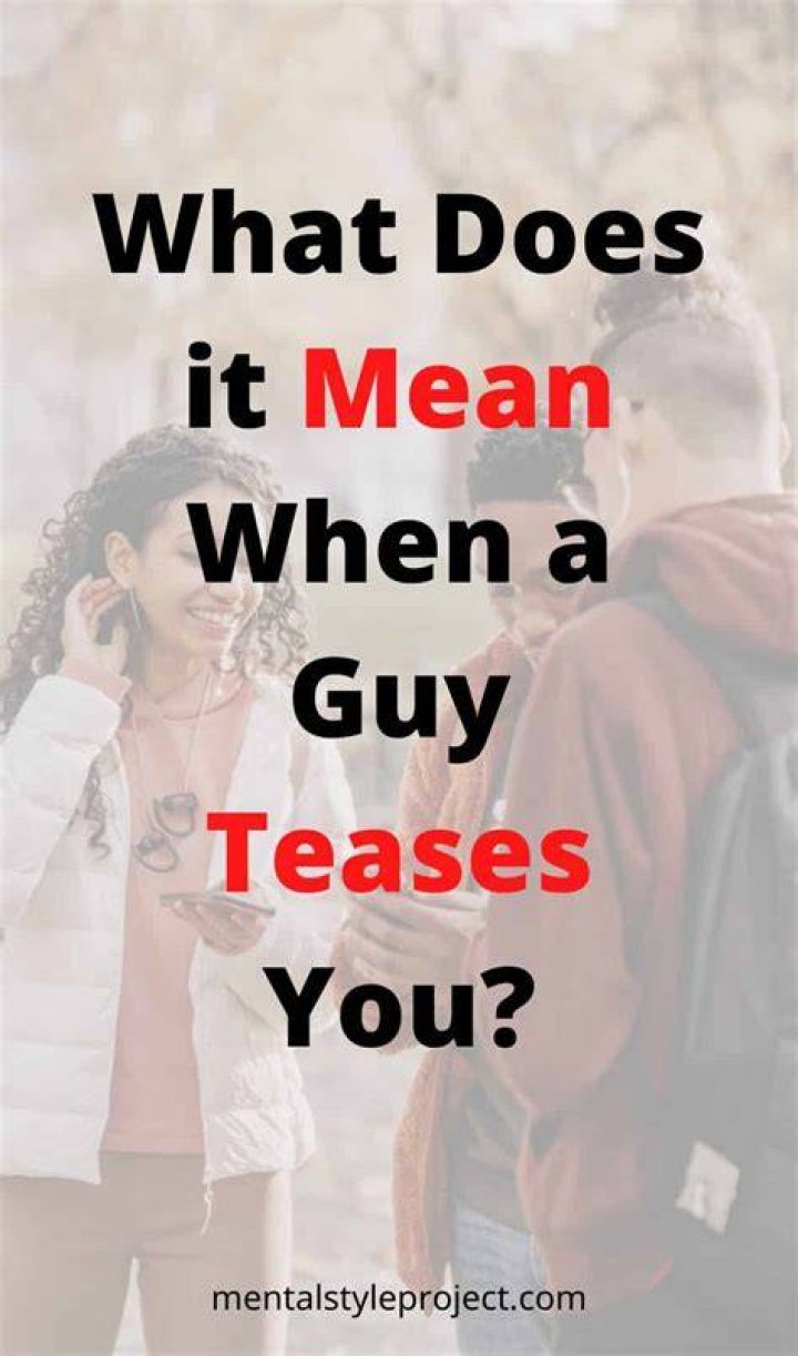 What does a guy do to get a girl's attention?