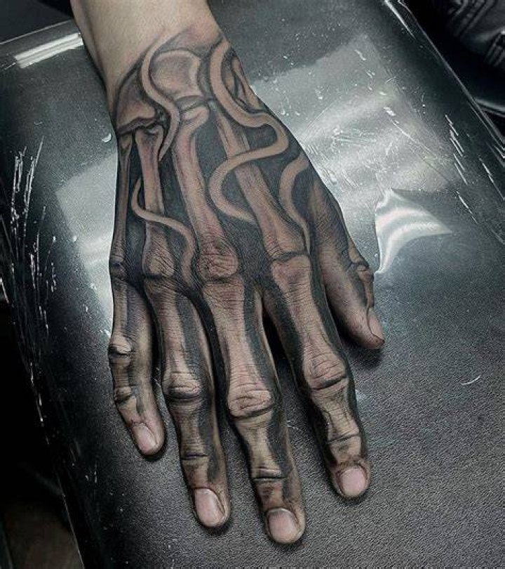 What does a skeleton hand tattoo mean?