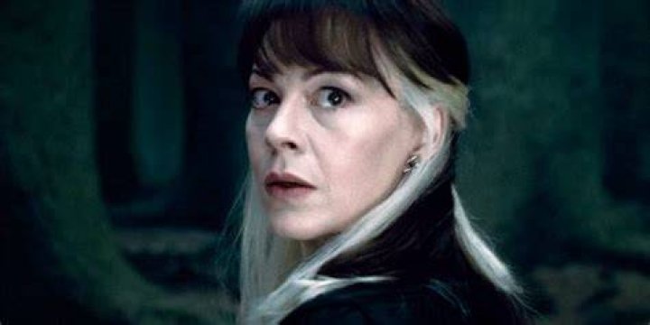 What does Mrs Malfoy whisper to Harry?