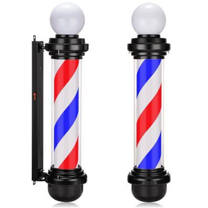 What does the red stripe on a barber pole represent?