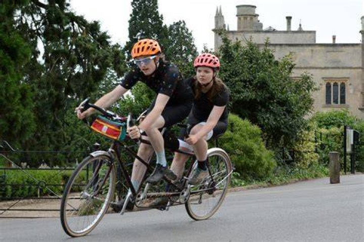 What is riding in tandem?