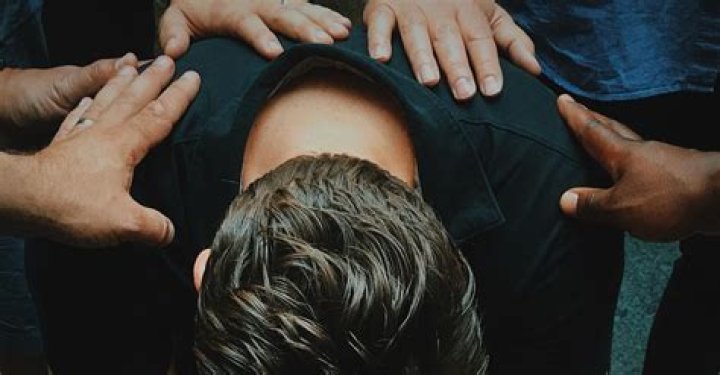 What is the biblical meaning of laying on of hands?