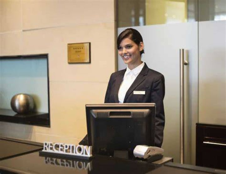 What is the front desk person at a hotel called?