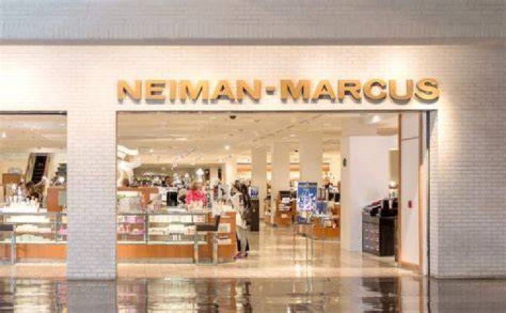 What is the stock symbol for Neiman Marcus?