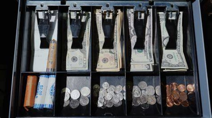 What should I look for when buying a cash register?