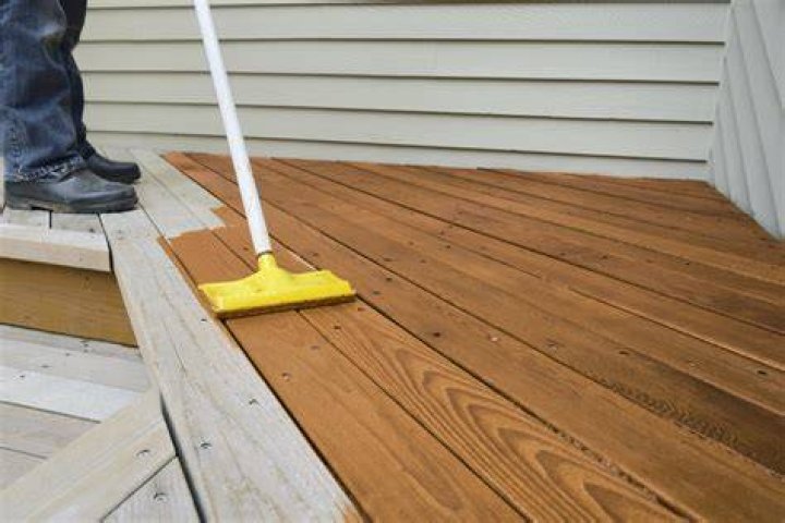 What time of year should I stain my deck?