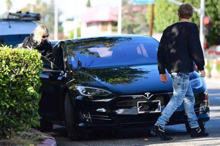 What was Miley Cyrus's first car?