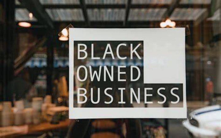What was the first black-owned business listed on the NYSE?