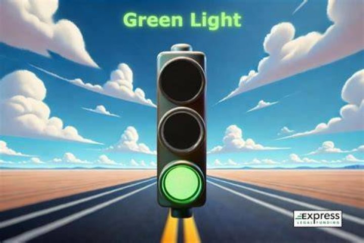 When a traffic signal light turns green you should?