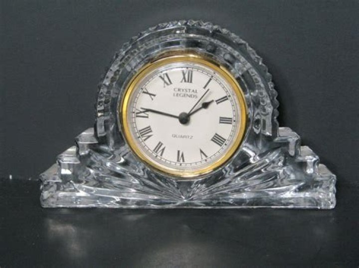 Who invented the quartz crystal clock?