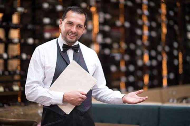 Who is a host in a restaurant?