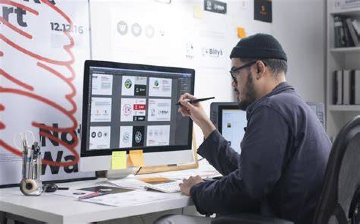 Who is the first graphic designer?
