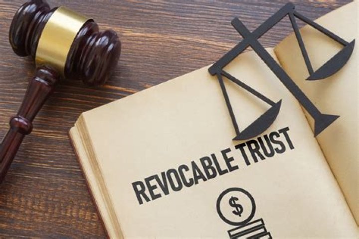 Who is the trustee in a revocable living trust?