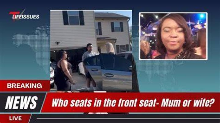 Who sits in front seat wife or mother?
