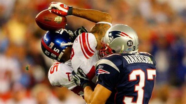 Who was defending the Helmet Catch?