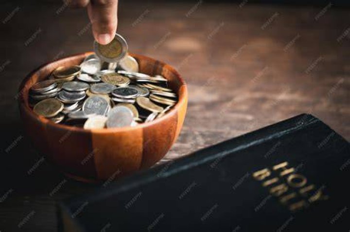 Who was supposed to pay a tithe to the church?