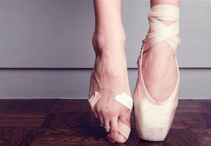 Why do ballet dancers dance on their toes?