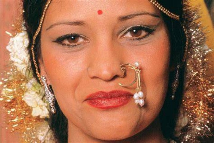 Why do Indian ladies pierce their nose?